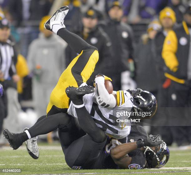 Pittsburgh Steelers running back Le'Veon Bell is finally pulled down by Baltimore Ravens inside linebacker Josh Bynes after catch and run gain of 29...
