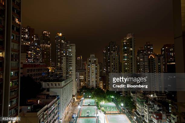 Apartment blocks stand in the Sheung Wan area of Hong Kong, China, on Wednesday, Nov. 13, 2013. Hong Kongs government has since 2010 imposed various...