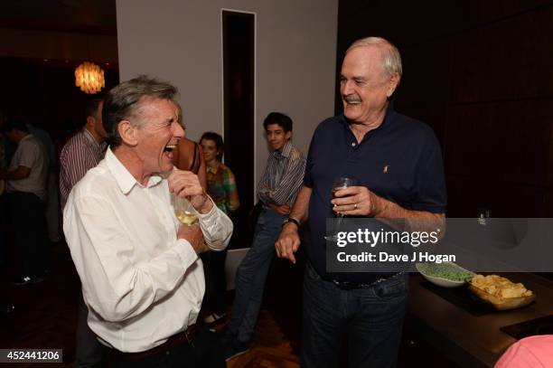 Michael Palin and John Cleese attend the closing night after party for 'Monty Python Live ' at The O2 Arena on July 20, 2014 in London, England.