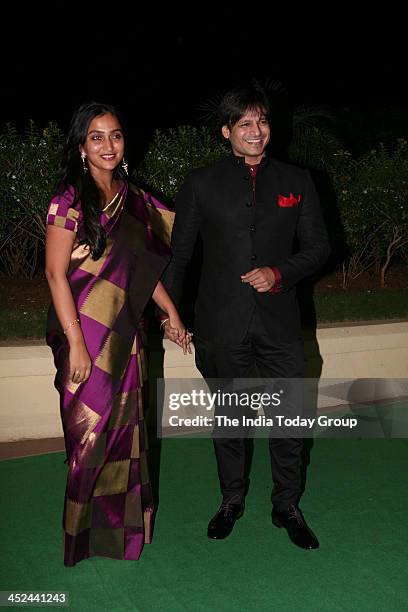 Vivek Oberoi with his wife Priyanka during the wedding reception of Vishesh Bhatt and Kanika Parab in Mumbai.