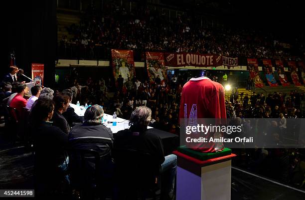 Press and Argentinos Jrs' fans attend a press conference after the official unveiling of Juan Roman Riquelme as a new Argentinos Jrs player at...