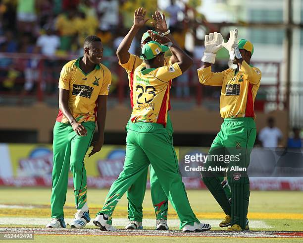 Players of Guyana Amazon Warriors celebrate during a match between Guyana Amazon Warriors and Jamaica Tallawahs as part of the week 2 of Caribbean...
