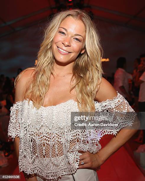 LeAnn Rimes attends Luli Fama fashion show during Mercedes-Benz Fashion Week Swim 2015 at Cabana Grande at The Raleigh on July 20, 2014 in Miami,...