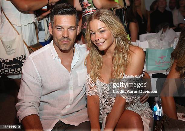 Eddie Cibrian and LeAnn Rimes attend Luli Fama fashion show during Mercedes-Benz Fashion Week Swim 2015 at Cabana Grande at The Raleigh on July 20,...