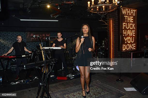 Brown and her band perform during The VV Brown Show Case Hosted By Paco Rabanne Excess Diary Perfume at the Tiitty Twister Club on November 28, 2013...