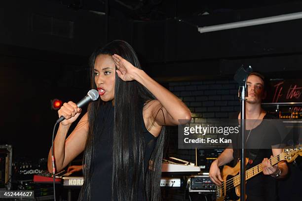 Brown and her band perform during The VV Brown Show Case Hosted By Paco Rabanne Excess Diary Perfume at the Tiitty Twister Club on November 28, 2013...