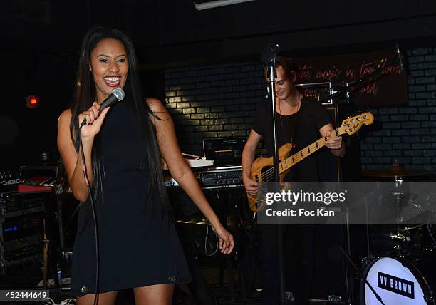 Brown and her band perform during The VV Brown Show Case Hosted By Paco Rabanne Excess Diary Perfume at the Tiitty Twister Club on November 28, 2013...