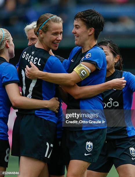 Beverly Goebel of the Seattle Reign FC celebrates with Keelin Winters after scoring a goal against the Chicago Red Stars at Moda Pitch at Memorial...