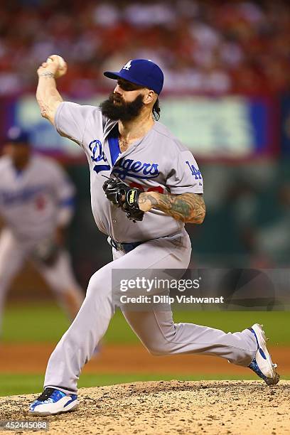 Reliever Brian Wilson of the Los Angeles Dodgers pitches against the St. Louis Cardinals in the eighth inning at Busch Stadium on July 20, 2014 in...
