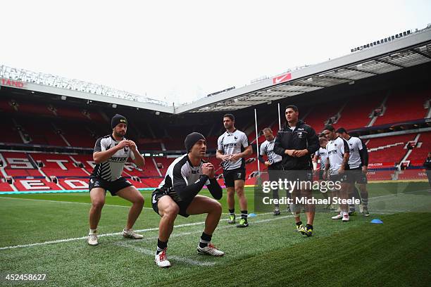 Shaun Johnson stretches during the New Zealand training session at Old Trafford on November 29, 2013 in Manchester, England.