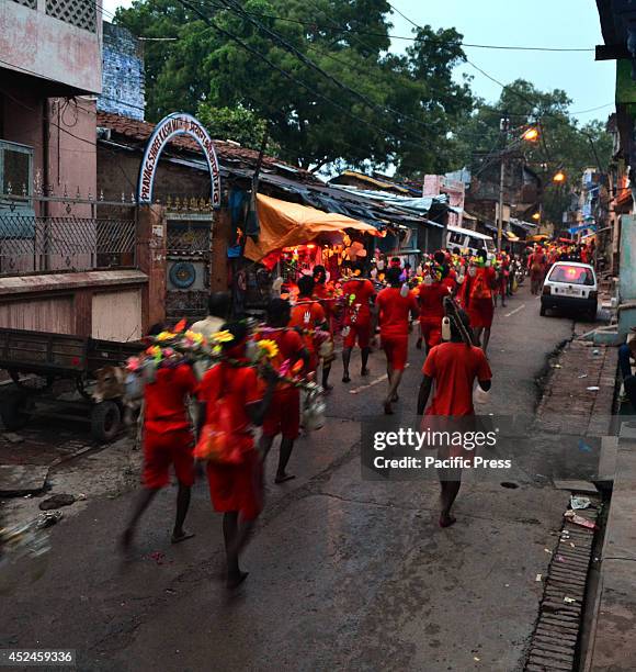 Indian Hindu devotees or "Kanwariyas" move for their Kanwar yatra in Allahabad. The Yatra takes place during the sacred month of Shravan from July to...