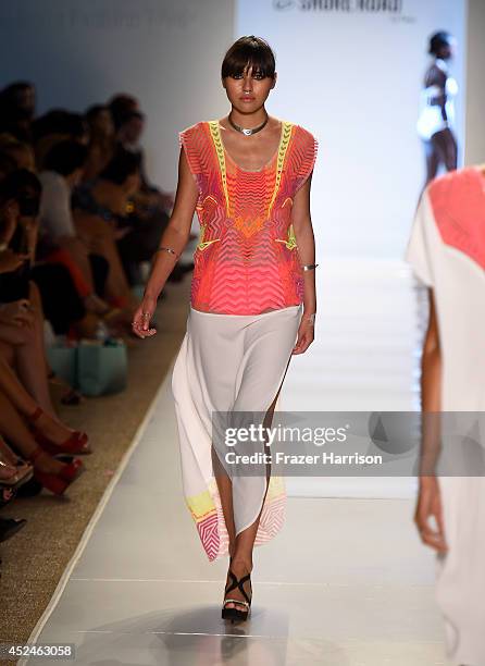 Model walks the runway during 6 Shore Road by Pooja fashion show during Mercedes-Benz Fashion Week Swim 2015 at Cabana Grande at The Raleigh on July...