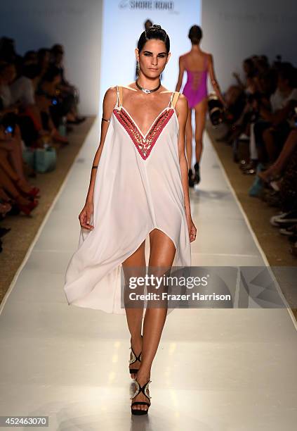 Model walks the runway during 6 Shore Road by Pooja fashion show during Mercedes-Benz Fashion Week Swim 2015 at Cabana Grande at The Raleigh on July...