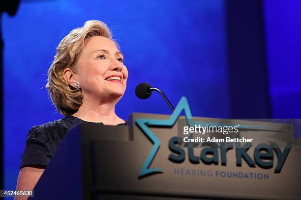 Hillary Clinton takes the stage during the 2014 Starkey Hearing Foundation So The World May Hear Gala at the St. Paul RiverCentre on July 20, 2014 in...