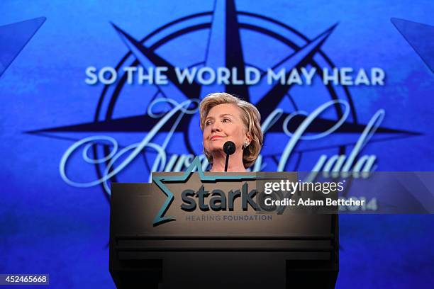 Hillary Clinton takes the stage during the 2014 Starkey Hearing Foundation So The World May Hear Gala at the St. Paul RiverCentre on July 20, 2014 in...