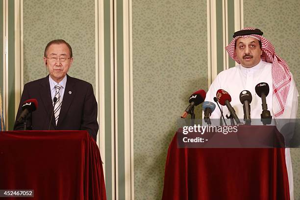 United Nations Secretary-General Ban Ki-moon and Qatar's foreign minister Khaled al-Attiya give a press conference on July 20, 2014 in Doha, Qatar,...