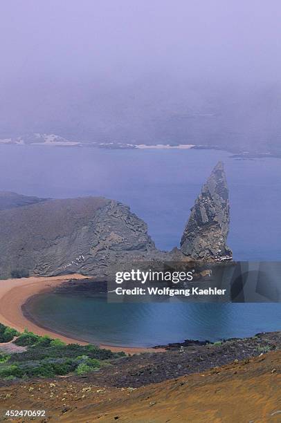 Ecuador,galapagos Islands, Bartolome Island, Fog, Pinnacle Rock.