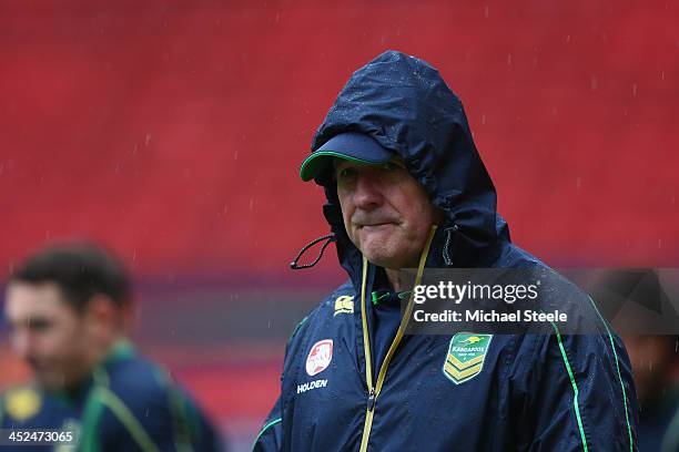 Tim Sheens, head coach of Australia looks on during the Australia training session at Old Trafford on November 29, 2013 in Manchester, England.