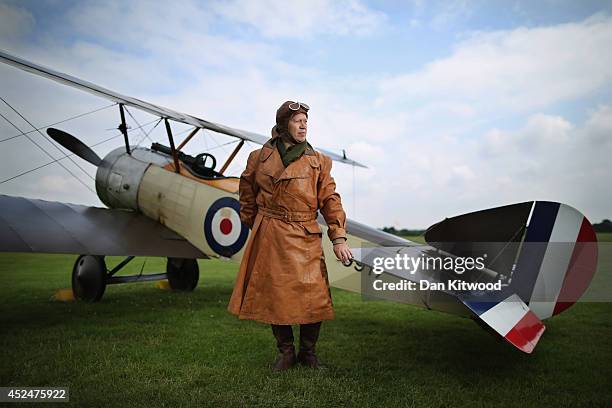 Shuttleworth Collection Pilot Rob Millinship, poses next to a Sopwith Pup during a photocall at 'The Shuttlesworth Collection' on July 21, 2014 in...