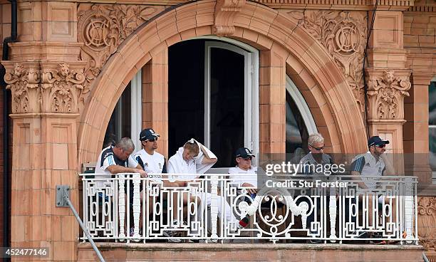 The England balcony with captain Alastair Cook Joe Root coach Peter Moores and Matt Prior look on during day five of 2nd Investec Test match between...