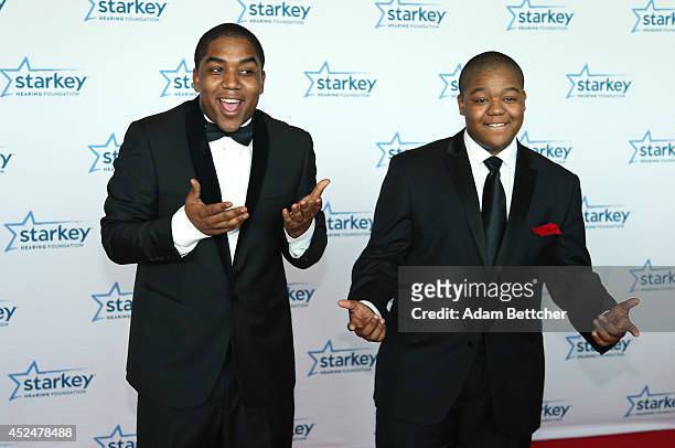 Chris Massey and Kyle Massey walk the red carpet at the 2014 Starkey Hearing Foundation So The World May Hear Gala at the St. Paul RiverCentre on...