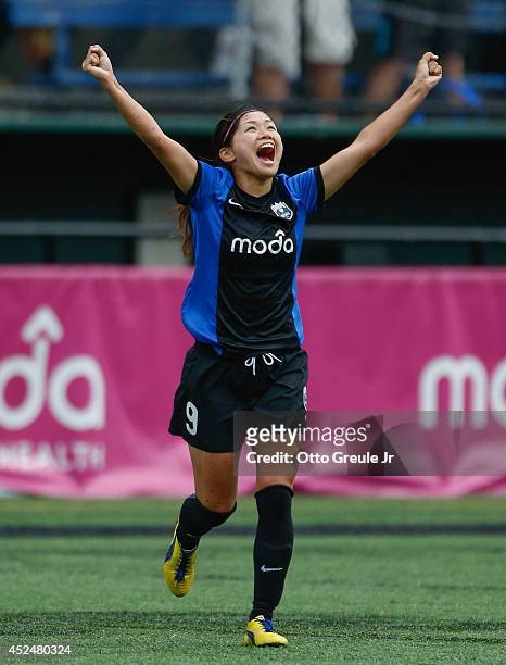 Nahomi Kawasumi of the Seattle Reign FC celebrates a team goal against the Chicago Red Stars at Moda Pitch at Memorial Stadium on July 20, 2014 in...