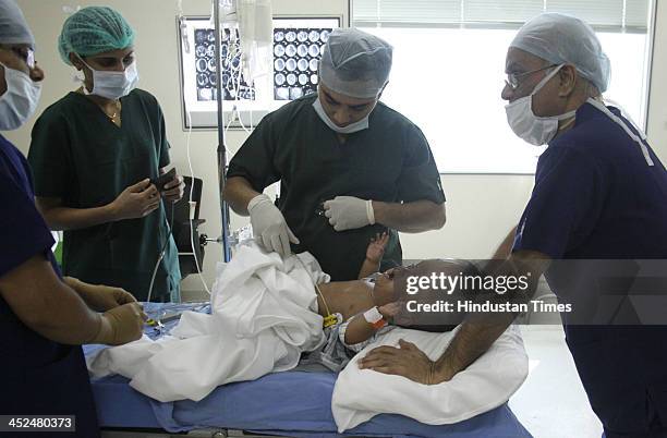 Baby Roona Baby Roona Begum Baby With Hydrocephalus Disease Photos and Premium ...