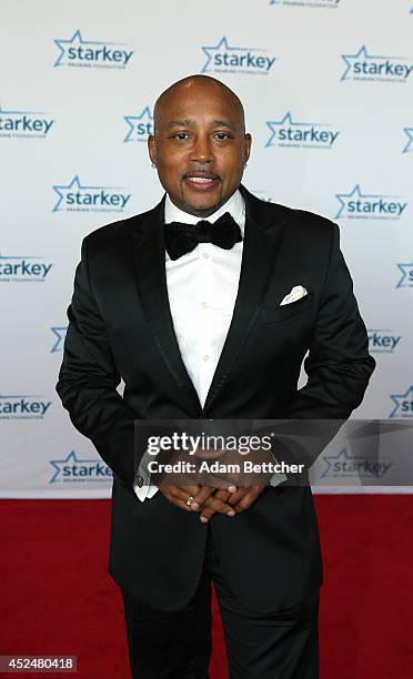 Daymond John walks the red carpet at the 2014 Starkey Hearing Foundation So The World May Hear Gala at the St. Paul RiverCentre on July 20, 2014 in...