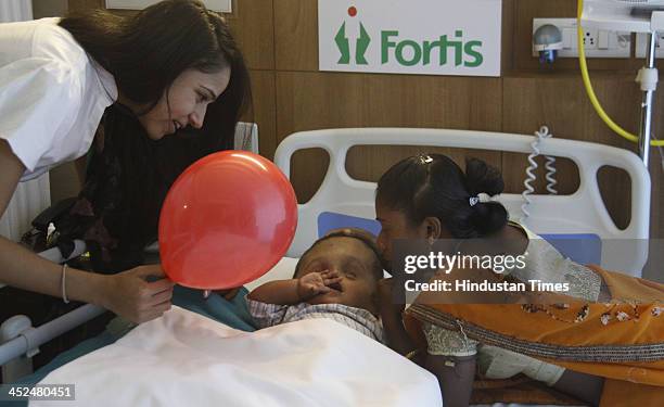 Baby Roona Baby Roona Begum Baby With Hydrocephalus Disease Photos and Premium ...