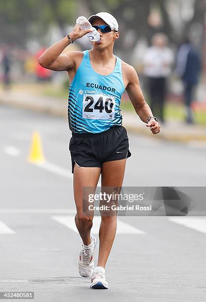 Cristian Chocho of Ecuador competes in 50k walk race as part of the XVII Bolivarian Games Trujillo 2013 at Juan Pablo Street on November 29, 2013 in...