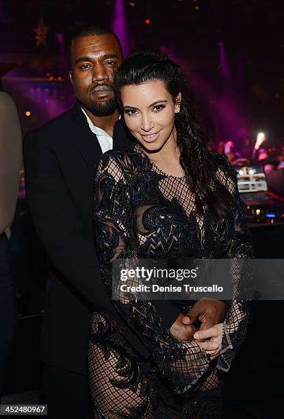 Kanye West and Kim Kardashian celebrate New Years Eve countdown at 1OAK Nightclub at the Mirage on December 31, 2012 in Las Vegas, Nevada.