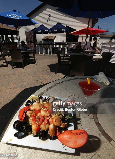 Mia Regazza's Signature lobster dish with a Pomegranate Martini at Mia Regazza.