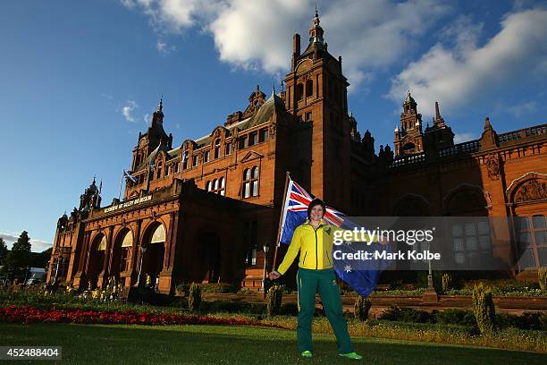 Anna Meares of Australia poses with the Australian flag after she was announced as the flag bearer for the opening ceremony, during the Austrlian...