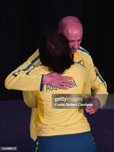 Australian Chef de Mission Steve Moneghetti congratulates flag bearer Anna Meares during the Australian Commonwealth Games official team reception at...