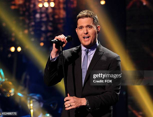 Singer Michael Buble performs on FOX's "The X Factor" Season 3 Top 8 To 6 Live Elimination Show on November 28, 2013 in Hollywood, California.