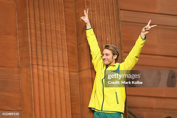 Matthew Mitcham gestures as he waits for the Australian team photo before the Australian Commonwealth Games official team reception at the Kelvin...