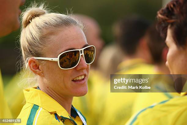 Sally Pearson speaks to a fellow team member before official team reception at the Kelvin Grove Art Gallery and Museum on July 21, 2014 in Glasgow,...