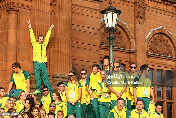 Matthew Mitcham gestures as he waits for the Australian team photo before the Australian Commonwealth Games official team reception at the Kelvin...