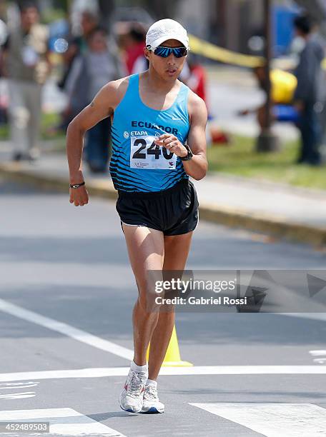 Cristian Chocho of Ecuador competes in 50k walk race as part of the XVII Bolivarian Games Trujillo 2013 at Juan Pablo Street on November 29, 2013 in...