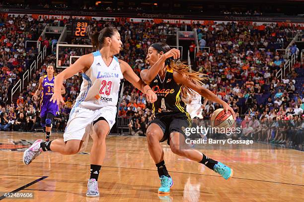 Skylar Diggins of the Western Conference All-Stars dribbles against Shoni Schimmel of the Eastern Conference All-Stars during the 2014 Boost Mobile...