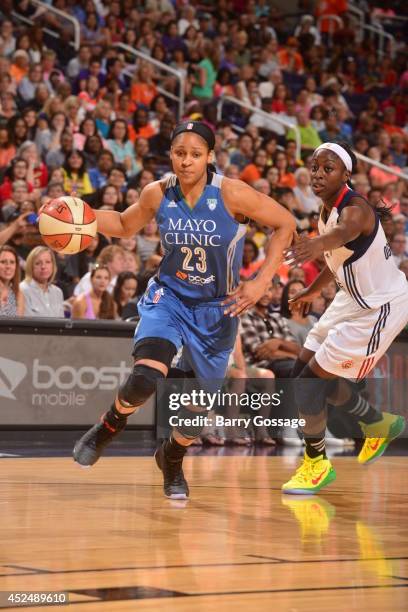 Maya Moore of the Western Conference All-Stars dribbles during the 2014 Boost Mobile WNBA All-Star Game on July 19, 2014 at US Airways Center in...