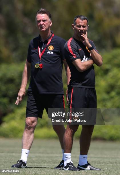 Manager Louis van Gaal and Assistant Manager Ryan Giggs of Manchester United in action during a first team training session as part of their...