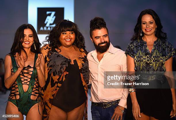 Personality Adriana De Moura, Brazilian actress Priscilla Marinho, designer A.Z Araujo and model/business woman Cozete Gomes walk the runway at the...