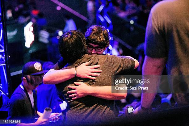 Fan embraces William "Blitz" Lee after meeting him in person for the first time at The International DOTA 2 Championships on July 21, 2014 in...