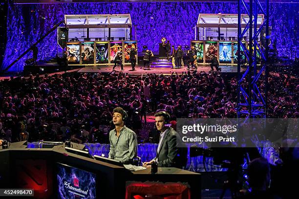 Members of Newbee pose on stage following their win at The International DOTA 2 Championships on July 21, 2014 in Seattle, Washington.