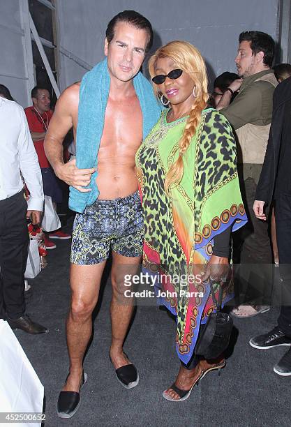Actor Vincent De Paul and Janice Combs pose backstage at the A.Z Araujo show during Mercedes-Benz Fashion Week Swim 2015 The Raleigh Hotel on July...