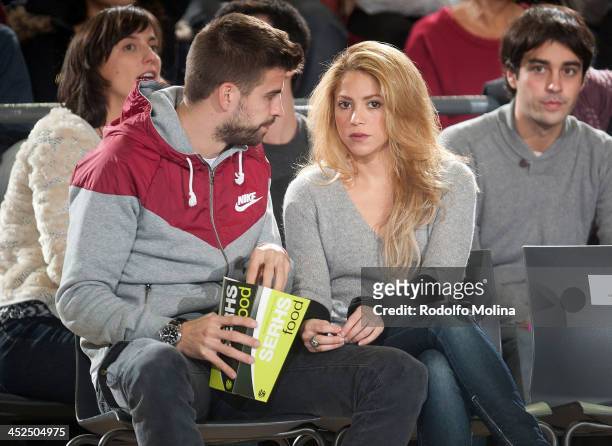 Gerard Pique, FC Barcelona soccer player and his partner singer Shakira attend the 2013-2014 Turkish Airlines Euroleague Regular Season Date 7 game...