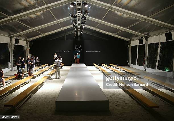 Model walks the runway during the Minimale Animale show during Mercedes-Benz Fashion Week Swim 2015 at The Raleigh on July 21, 2014 in Miami Beach,...