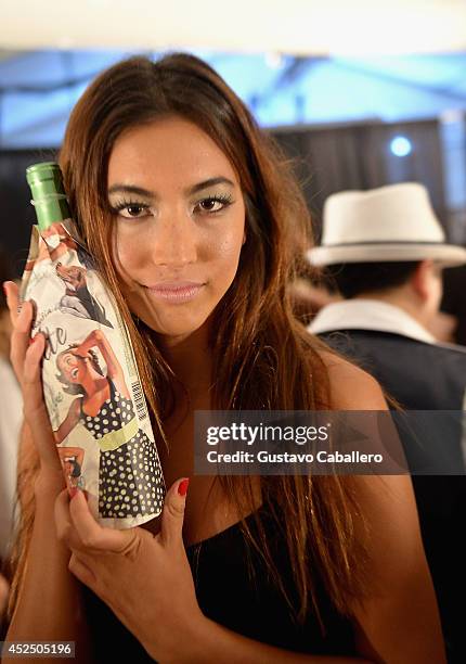 Model poses backstage at Indah fashion show during Mercedes-Benz Fashion Week Swim 2015 at Cabana Grande at the Raleigh Hotel on July 21, 2014 in...