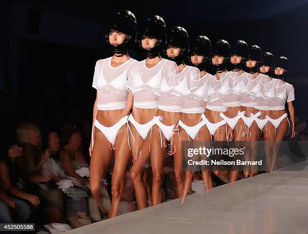 Model walks the runway at the Minimale Animale fashion show during Mercedes-Benz Fashion Week Swim 2015 at The Raleigh on July 21, 2014 in Miami...